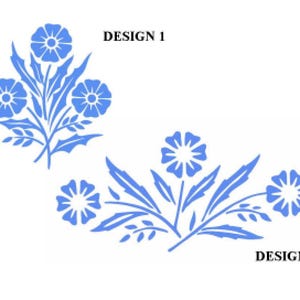 May include: Two blue floral designs on a white background. Design 1 features three flowers and leaves, while Design 2 has three flowers and leaves. The text "DESIGN 1" and "DESIGN 2" are above and to the right of the designs.