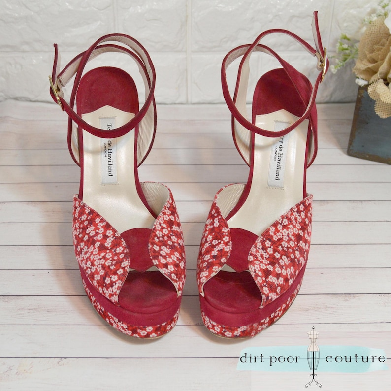 designer glam heels
terry de havilland
70s style platforms
vintage red heels
chunky heel vintage
rare velvet heels
retro peep toe shoe
red ankle strap heel
designer shoe
velvet platforms
peep toe shoes
floral heels
collector fashion
