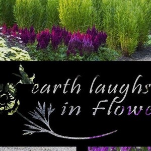 Metal garden sign, earth laughs in flowers
