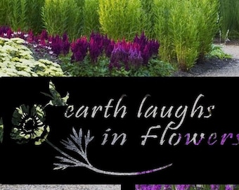 Metal garden sign, earth laughs in flowers