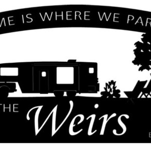 Metal camper sign with campfire and chairs