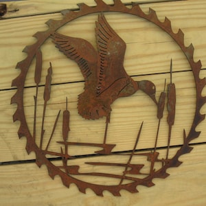 Duck in cattails sawblade metal art