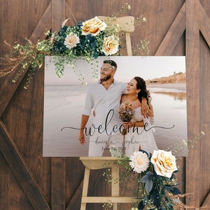 May include: A wedding welcome sign with a photo of a couple on a beach. The sign says "welcome daniela & sophia june 24, 2021".