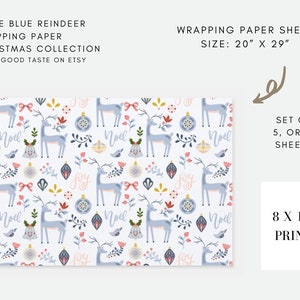 May include: Wrapping paper sheet with a repeating pattern of blue reindeer, Christmas ornaments, and floral elements on a white background. The sheet measures 20 x 29 inches. The words "Noel" and "Joy" are also included in the design.