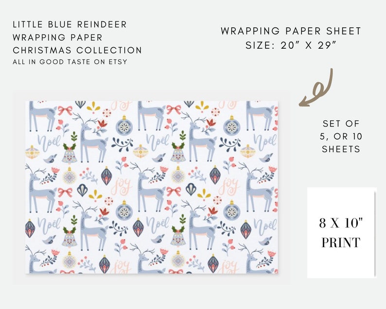 May include: Wrapping paper sheet with a repeating pattern of blue reindeer, Christmas ornaments, and floral elements on a white background. The sheet measures 20 x 29 inches. The words "Noel" and "Joy" are also included in the design.