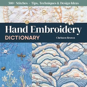 May include: A book cover with the title "Hand Embroidery Dictionary" by Christen Brown. The cover features a blue and white embroidered design of clouds and a blue denim fabric with embroidered flowers and a dragonfly.