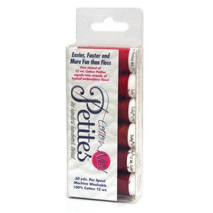 May include: A package of six spools of red embroidery thread labeled "Petites Cotton-Knu" with the text "Easier, Faster and More Fun than Floss" and "50 yds. Per Spool Machine Washable 100% Cotton 12 wt."