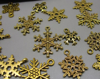 8 Snowflake Christmas charms bright gold tone GC371