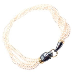 Collar Panthere de Cartier Panther en oro amarillo de 18 quilates y perla plateada con esmeralda
