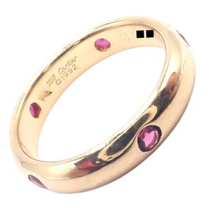 ¡Auténtico! Anillo Cartier Stella de oro rosa de 18k con rubíes, talla 51.