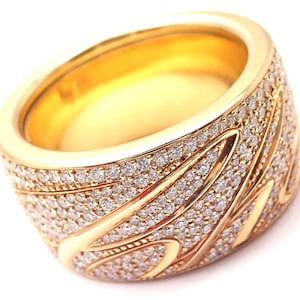 Anello Chopard Chopardissimo in oro giallo 18 carati con pavé di diamanti e firma, con scatola e carta.