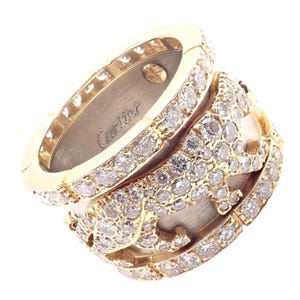 Anillo de oro blanco y amarillo de 18 k con diamantes Walking Panthere de Cartier Mahango