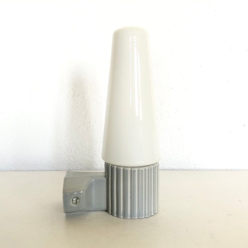 Swedish mid century minimalist Ifö wall lamp in grey grooved porcelain and white opal glass shade - shops design by Sigvard Bernadotte