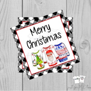 May include: A white card with black and red checkered borders. The card says "Merry Christmas" in black text. There are three illustrations of Christmas sweaters with different designs. The sweaters are red, blue, and green.