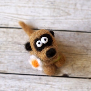Needle felted meerkat with a small flower image 5