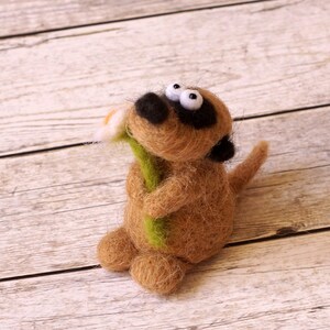 Needle felted meerkat with a small flower image 3