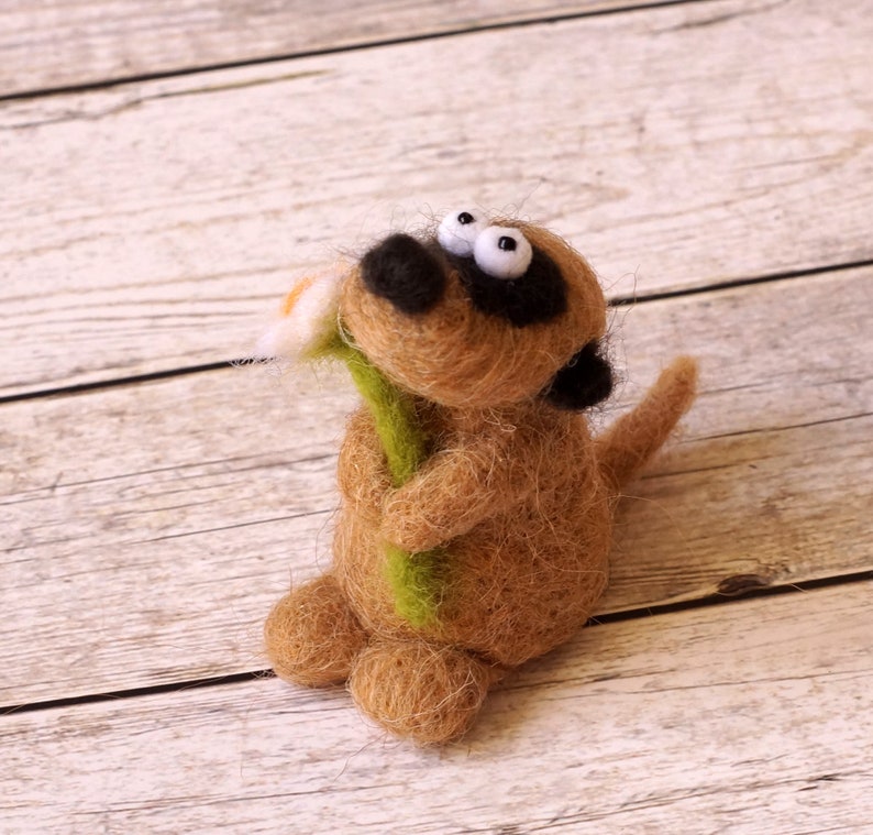Needle felted meerkat with a small flower image 3