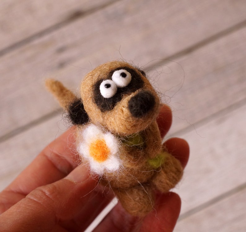 Needle felted meerkat with a small flower image 4