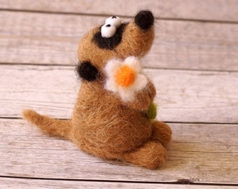 Needle felted meerkat with a small flower