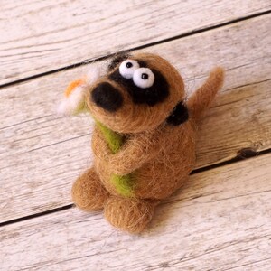 Needle felted meerkat with a small flower image 2