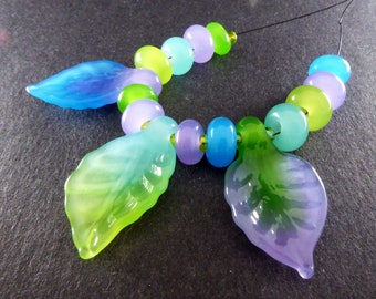 Spring Colours Lampwork Glass Leaf Beads Set of 15 - 3 leaves + 12 spacers -  Soft Translucent Purple Greens Blues Hand Made Art Glass #448