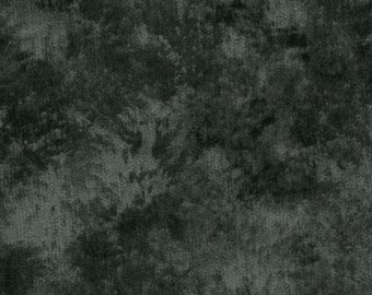 May include: Dark gray fabric with a mottled pattern, resembling a cloudy sky or stone texture. The fabric has a subtle, textured appearance, and a ruler is placed along the bottom edge for scale.