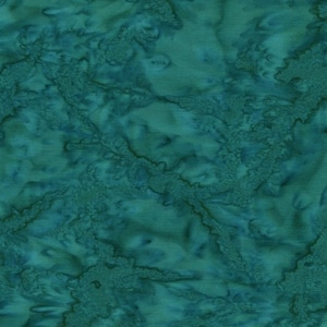 May include: A close-up of teal fabric with a batik-style pattern. The fabric has a mottled appearance with darker teal and blue accents, creating a textured, organic design. The fabric is measured in inches.