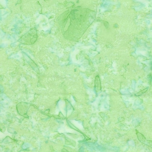 May include: A green fabric with a marbled pattern. The fabric has a light green background with darker green swirls and streaks.