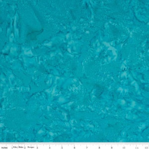 May include: A close-up of a turquoise fabric with a textured, mottled pattern. The fabric has a watercolor-like appearance with variations in shade, creating a visually interesting surface. The fabric is approximately 12 inches wide.