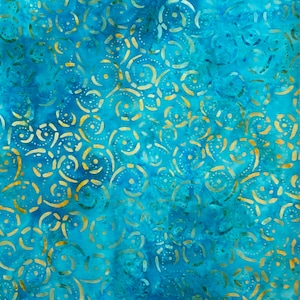May include: A vibrant fabric with a batik design. The background is a blend of blues, with a pattern of golden-yellow circles and dots. The design has a swirling, organic feel, suitable for quilting or apparel.