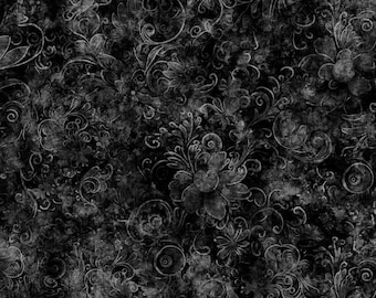 May include: A black and dark gray fabric featuring a repeating pattern of intricate floral motifs and swirling scrollwork. The design has a distressed, textured appearance with varying shades of charcoal and slate creating depth across the surface.