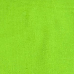 May include: A solid green fabric background with a smooth, even texture.