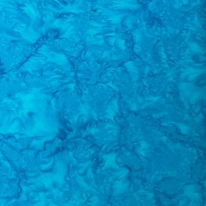 May include: A blue fabric with a swirling, marbled pattern. The fabric has a light blue background with darker blue swirls and marbling.