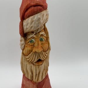 Hand carved Santa figurine