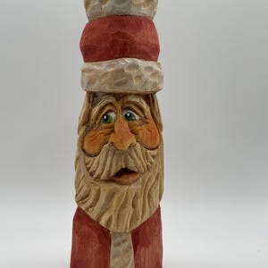 Hand carved Santa figurine
