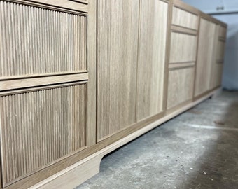 Large reeded white oak vanity available in any size or color.
