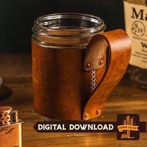 May include: A clear glass jar with a brown leather handle and sleeve. The leather is stitched with white thread and secured with copper rivets. The words "DIGITAL DOWNLOAD" are visible on the bottom of the image.