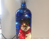 Snowman Inspired Stained Glass look Lighted Handpainted Wine Bottle