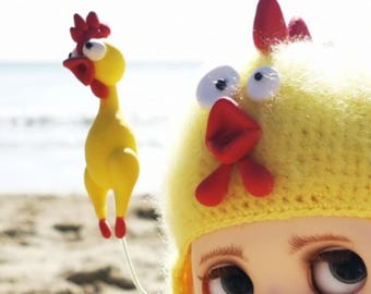 Chapéu de galinha e balão