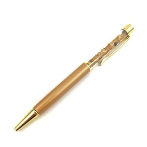 Penna a sfera riempita con pietre di ambra naturale / Beige