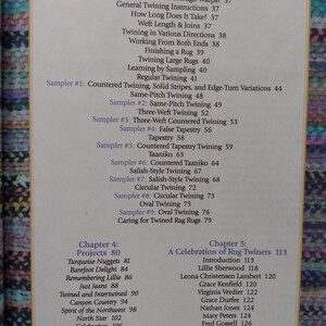 May include: A book cover with the title "A Celebration of Rug Twiners" and a list of names and page numbers. The book is about rug twining, a traditional craft.
