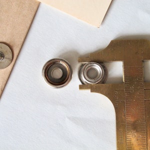 Button snap in nickel for your next craft project