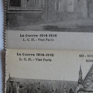 May include: A black and white photograph of a building with a text overlay that reads "La Guerre 1914-1918 L. C. H. - Vis&eacute; Paris 688 - SOISSONS - L SOISSONS - T"