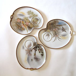 Set of three Japanese hand painted porcelain luncheon plates