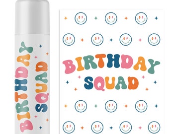May include: A white cylindrical lip balm tube and a matching rectangular label featuring the text "BIRTHDAY SQUAD" in colorful, wavy, retro-style lettering. The design includes small smiley faces with lightning bolt eyes and tiny star icons.