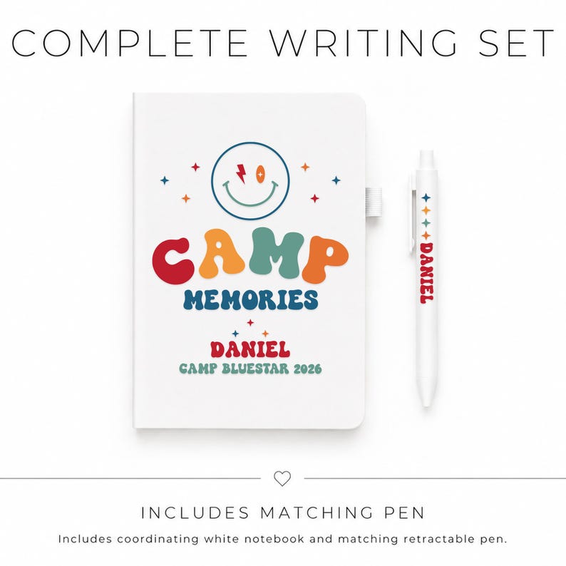 May include: A white notebook and matching retractable pen set. The notebook cover features a smiley face, stars, and the text "CAMP MEMORIES DANIEL CAMP BLUESTAR 2026". The pen is white with the name "DANIEL" and small star icons printed on it.