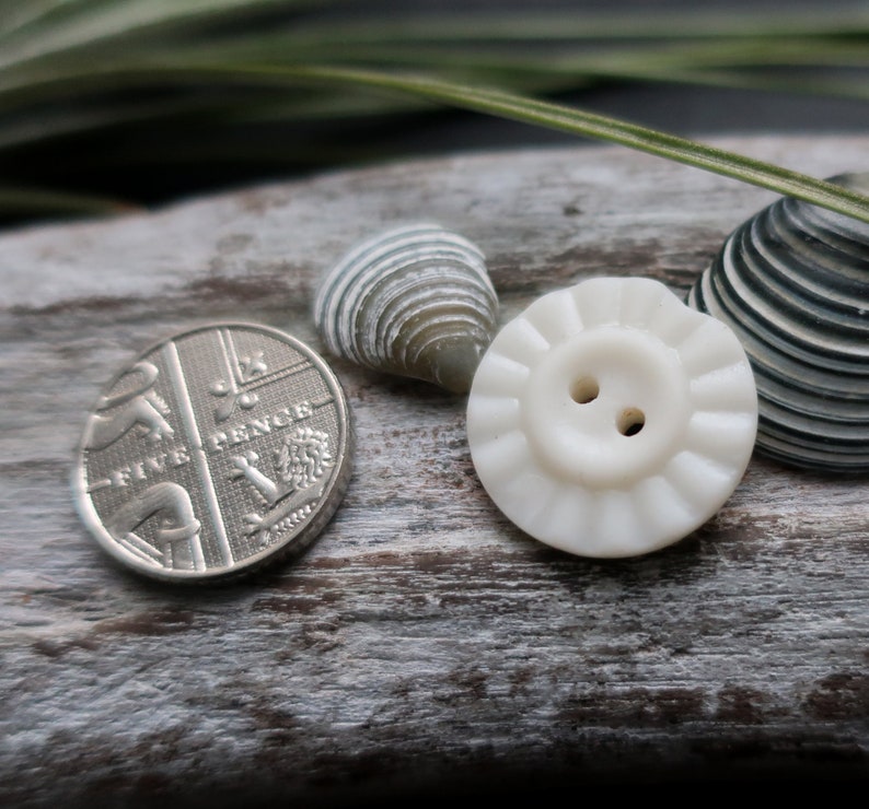 found on the west coast of scotland White milk sea glass button vintage button