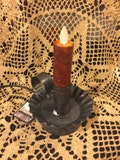 Moving flame bulb plug in tin ware
