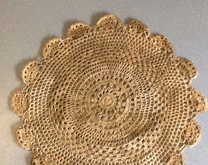 16" wide antique tea dyed doily
