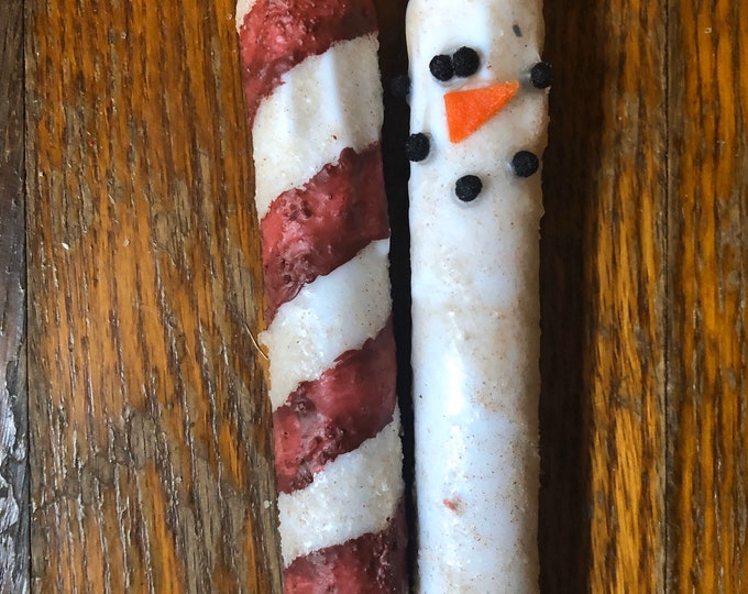 7" battery operated taper candle with FROSTY face or hand painted candy cane stripes